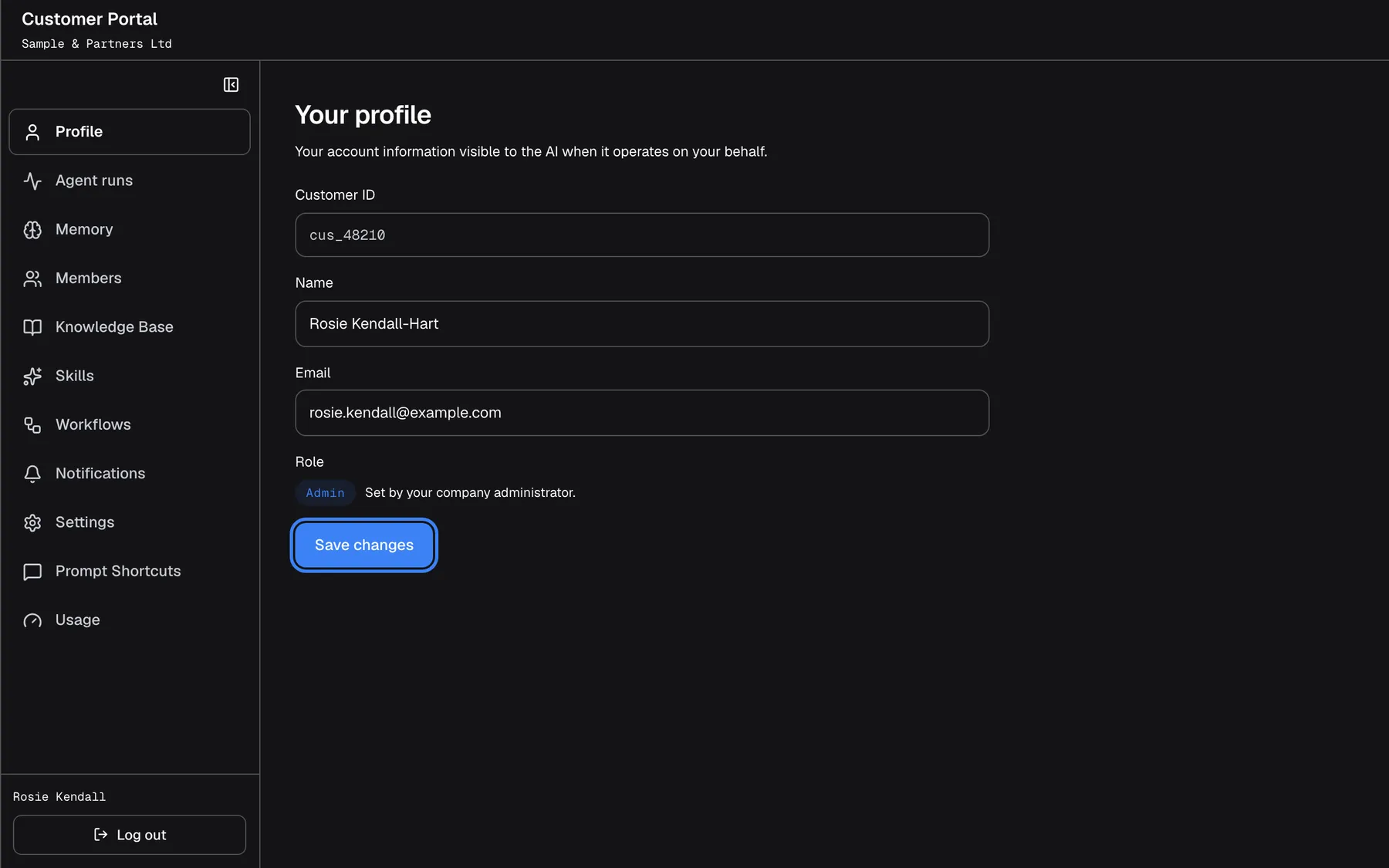 The "Your profile" page after the name was changed to "Rosie Kendall-Hart". The blue "Save changes" button below the form is now active and highlighted; selecting it stores the new name and shows "Profile saved.". Customer ID "cus_48210", the email "rosie.kendall@example.com" and the role "Admin" are unchanged.